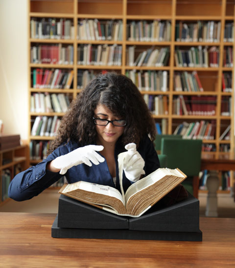 Erene Rafik Morcos documenting the Abbey Bible in the Manuscripts Study Room at the J. Paul Getty Museum Erene Rafik Morcos documenting the Abbey Bible in the Manuscripts Study Room at the J. Paul Getty Museum