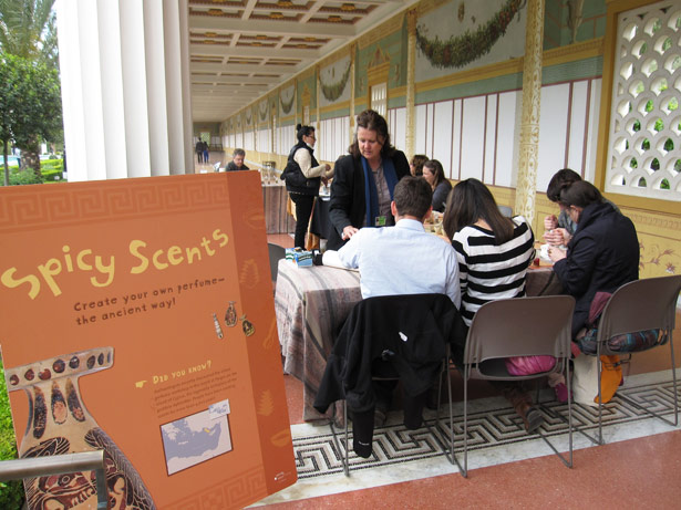 Visitors make perfumes inspired by ancient recipes during a Spicy Scents workshop at the Getty Villa
