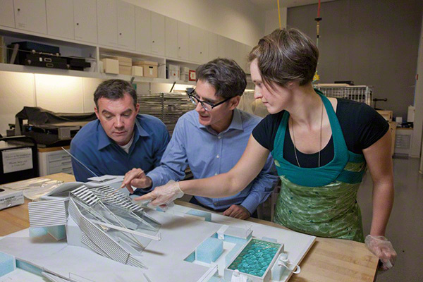 Tom Learner and Juliane Wattig, working on an architectural model