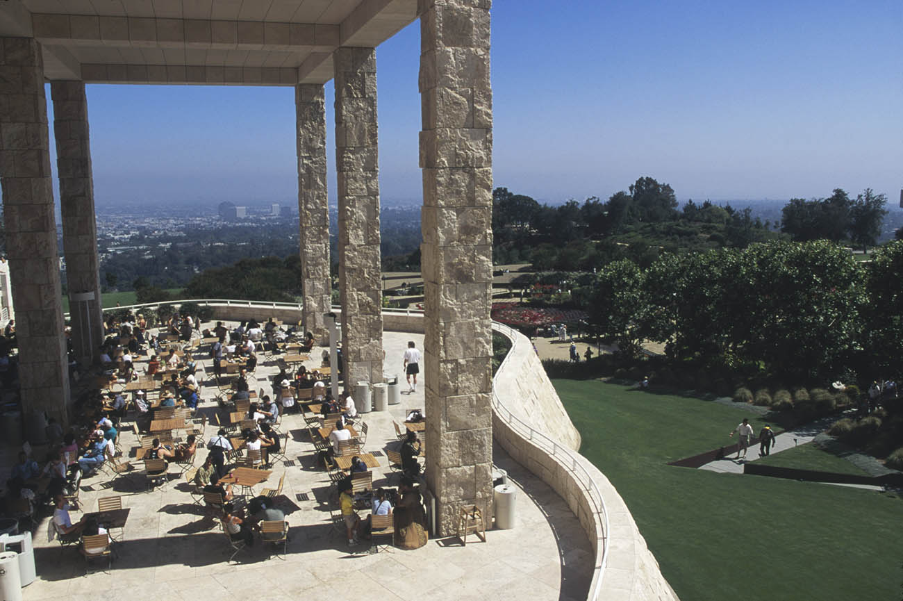 View of the Garden Terrace Cafe and Central Garden at the Getty Center with Los Angeles in the background.