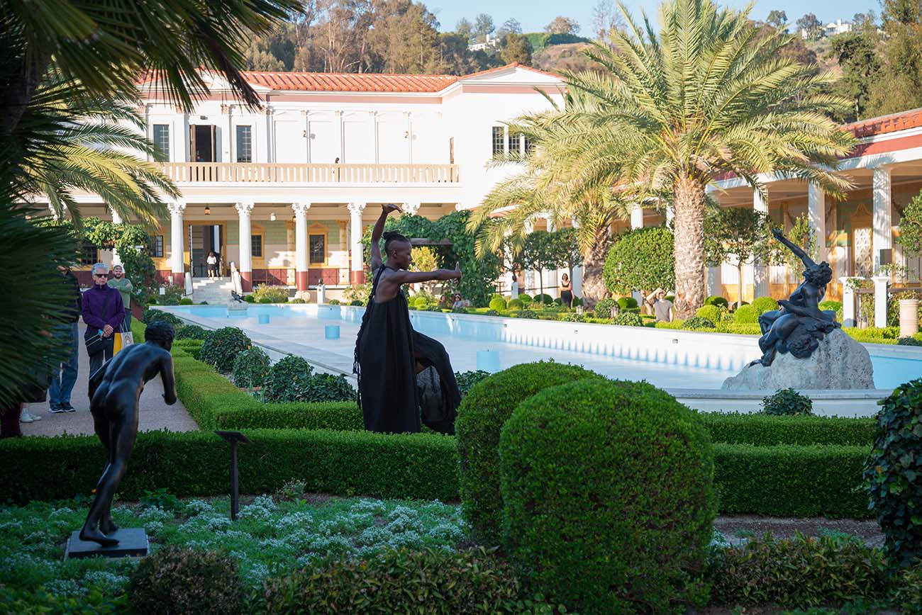 taisha paggett dances near the fountain in the Getty Villa's Outer Peristyle Garden. taisha paggett dances near the fountain in the Getty Villa's Outer Peristyle Garden.