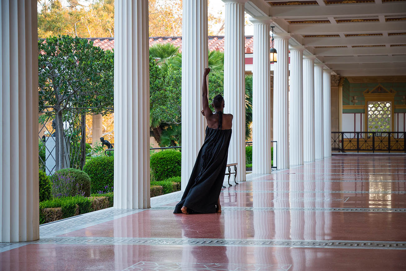 taisha paggett dances in the covered walkway of the Getty Villa's Outer Peristyle Garden. taisha paggett dances in the covered walkway of the Getty Villa's Outer Peristyle Garden.