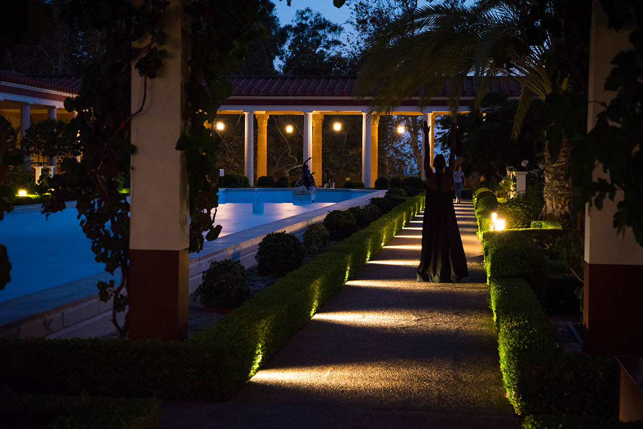 At night, taisha paggett dances near the fountain in the Getty Villa's Outer Peristyle Garden. At night, taisha paggett dances near the fountain in the Getty Villa's Outer Peristyle Garden.