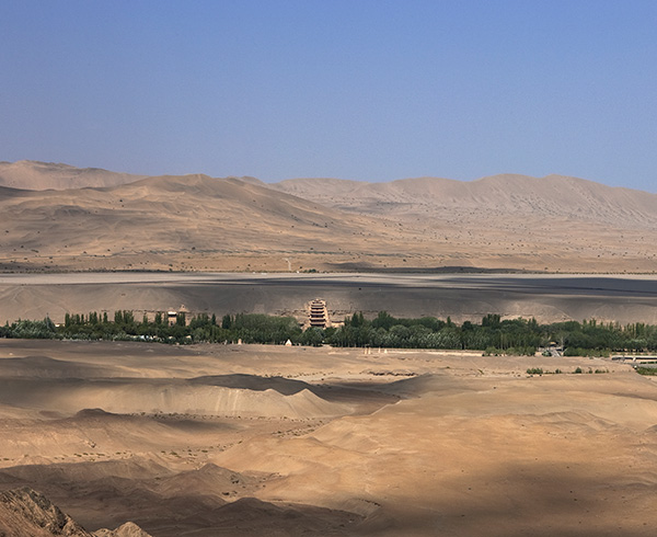 The cave temples of Dunhuang are surrounded by austere desert The cave temples of Dunhuang are surrounded by austere desert