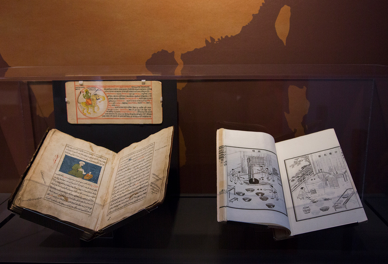 Three rare handmade books from Asia depicting Mercury